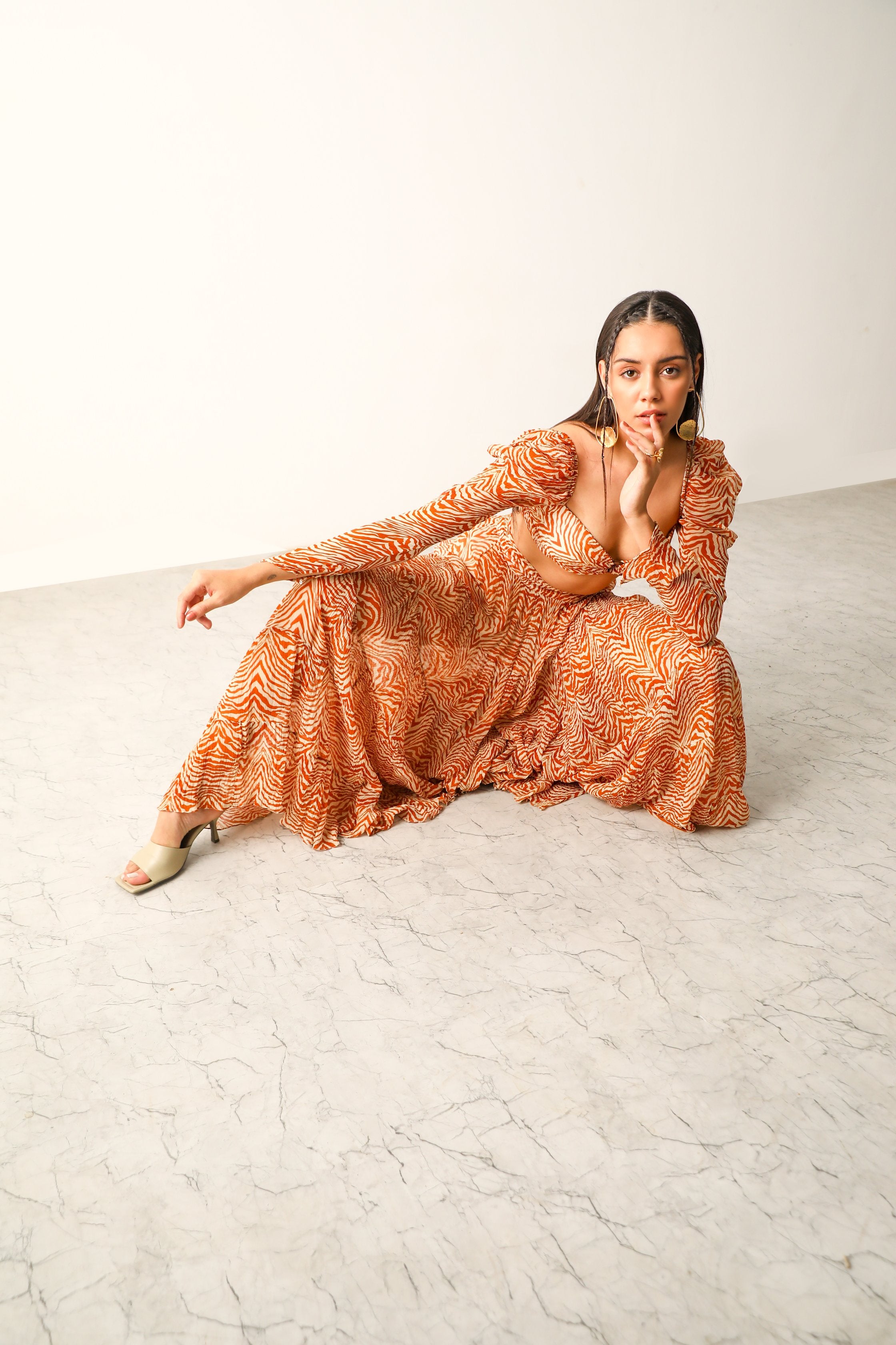 Pooja Hedge in Sander Bandeau & Tier Midi Skirt