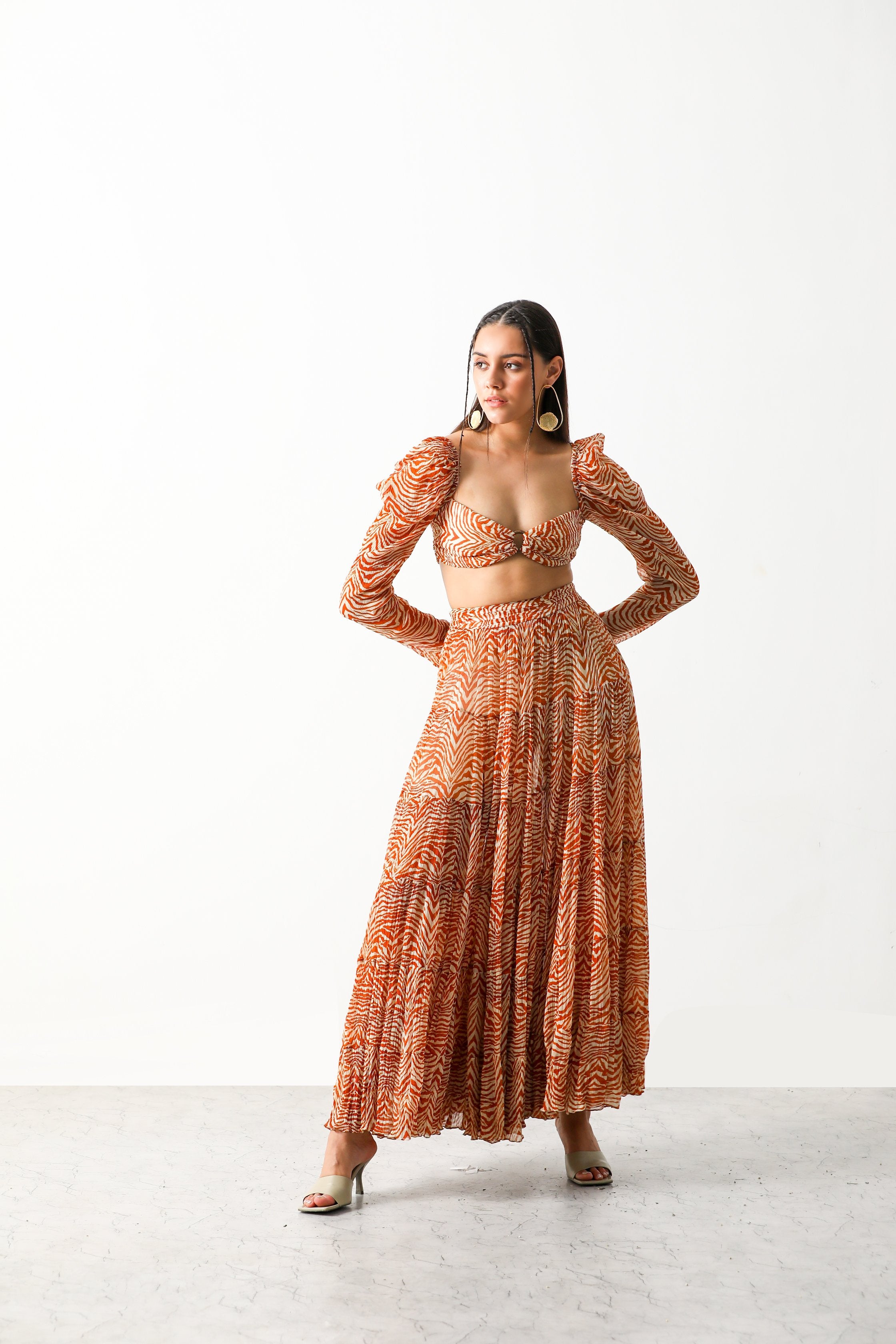 Pooja Hedge in Sander Bandeau & Tier Midi Skirt