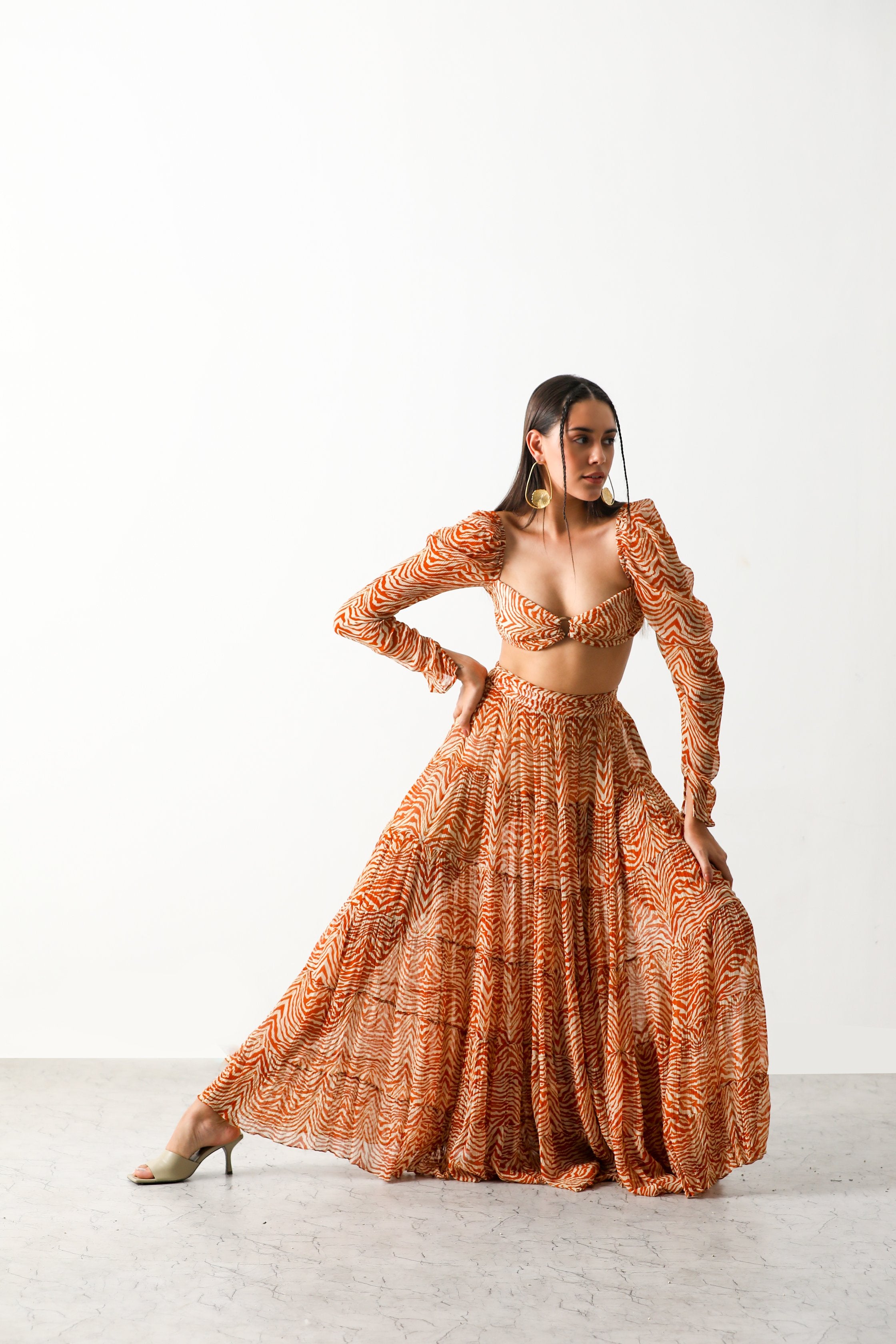 Pooja Hedge in Sander Bandeau & Tier Midi Skirt