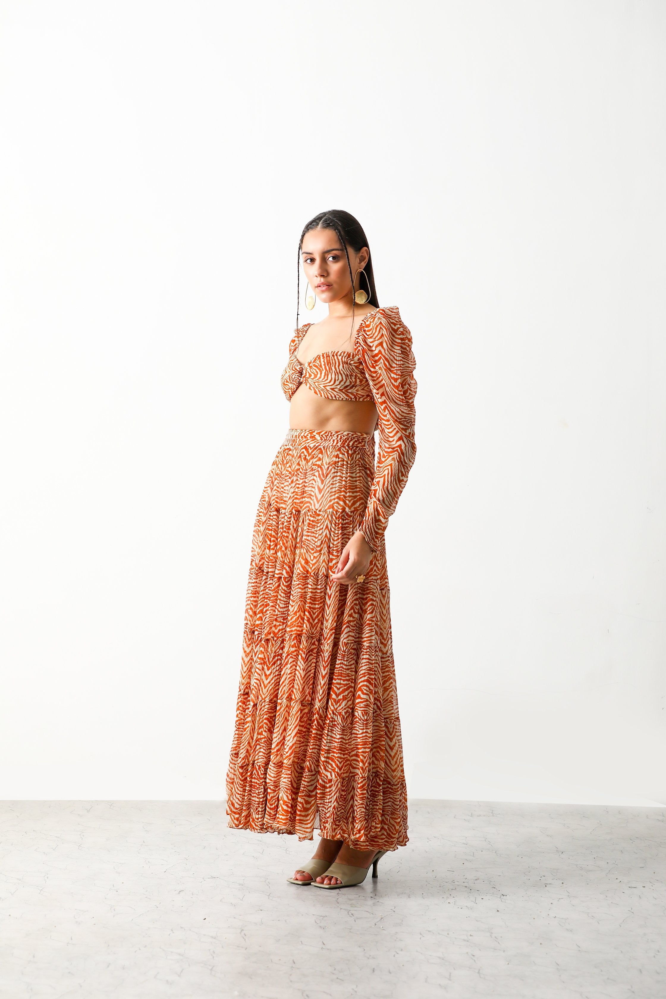 Pooja Hedge in Sander Bandeau & Tier Midi Skirt