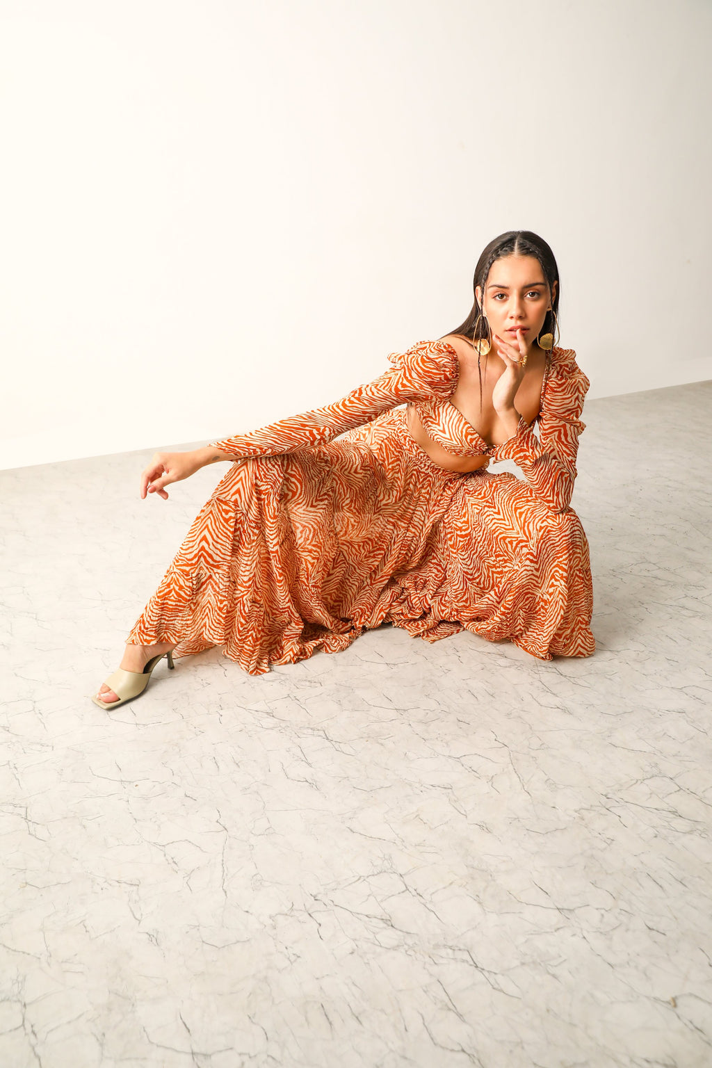Pooja Hedge in Sander Bandeau & Tier Midi Skirt