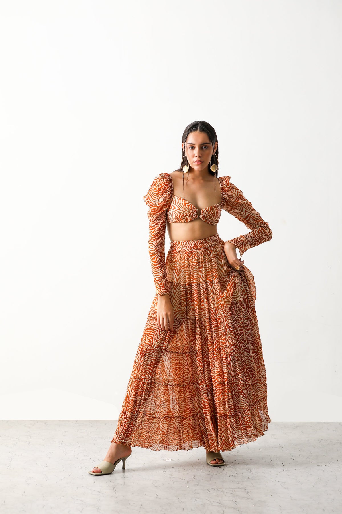 Pooja Hedge in Sander Bandeau & Tier Midi Skirt