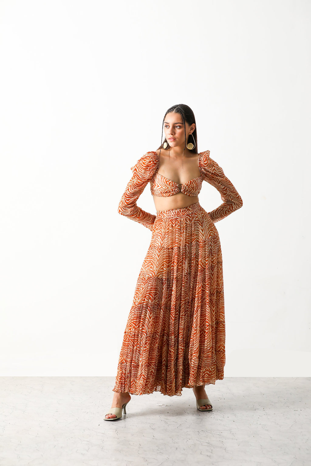 Pooja Hedge in Sander Bandeau & Tier Midi Skirt